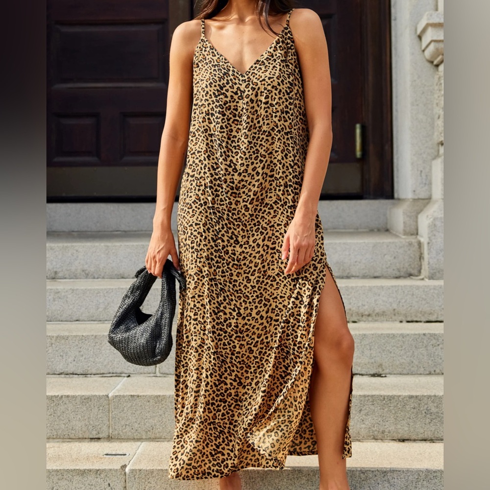 THE SPOTTED ON THE SCENE
LEOPARD DRESS Kenny Flowers sold out